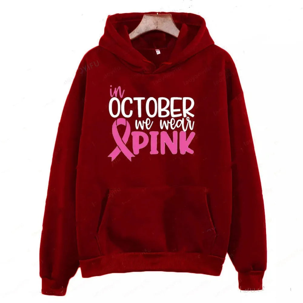 Pullover hoodie with 'I'm A Survivor' hot stamping print and side seam pockets in street fashion style