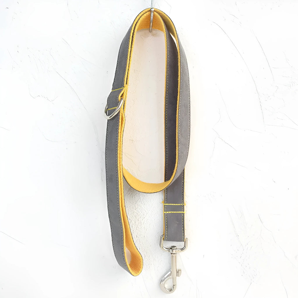 Grey and yellow dog leash made from polyester fibre, shown on a flat surface, available in multiple sizes