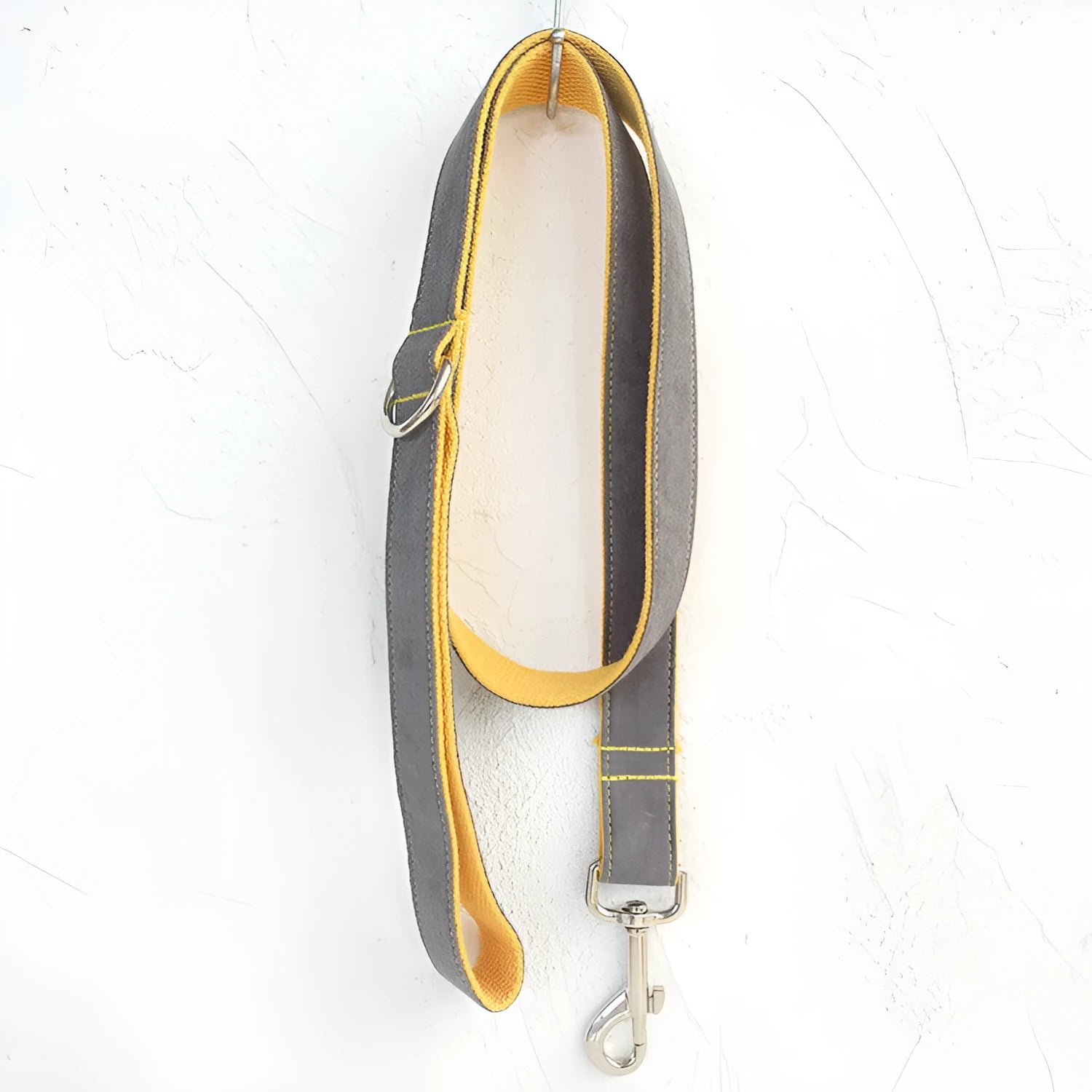 Grey and yellow dog leash made from polyester fibre, shown on a flat surface, available in multiple sizes