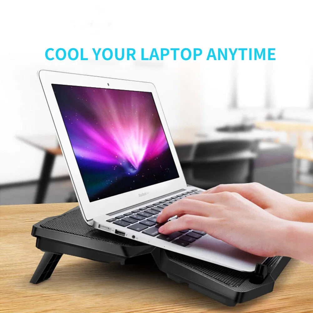 Blue computer cooling base with four LED fans and USB ports for desktop exhaust ventilation