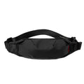 Black Oxford cloth waist pack with crossbody strap showing phone and ID pockets