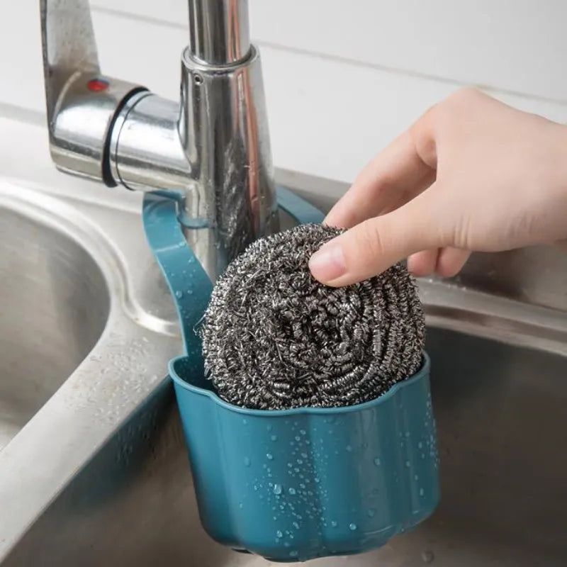 Nordic style plastic sink drain basket in dark blue colour measuring 20cm by 10cm