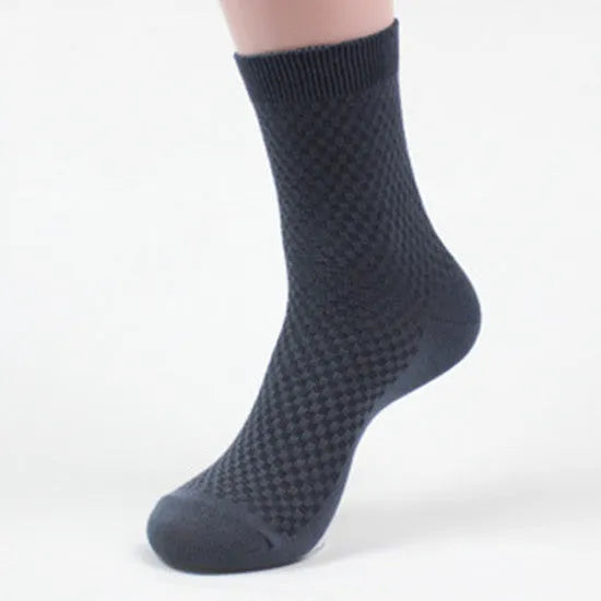 Men's bamboo fibre business socks in five neutral colours showing small square pattern