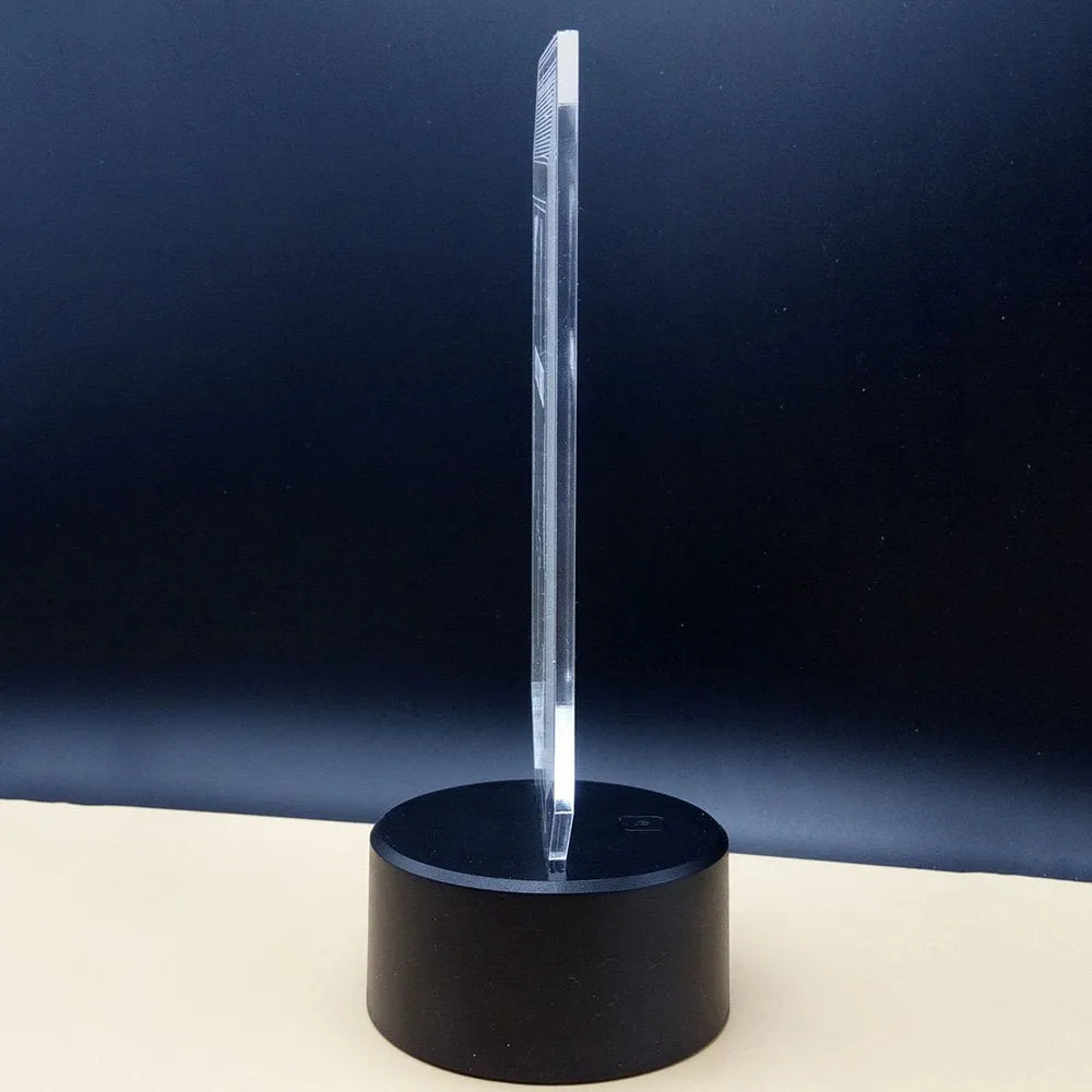 3D brain illusion LED desk lamp with acrylic design and remote control on wooden surface