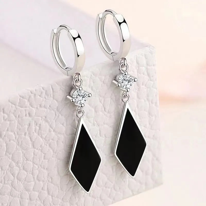 Silver vintage diamond geometric earrings with Japanese Korean style influences and ear clip design