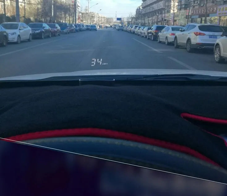 A100 OBD II head up display projecting vehicle speed on windscreen, with white or green light option