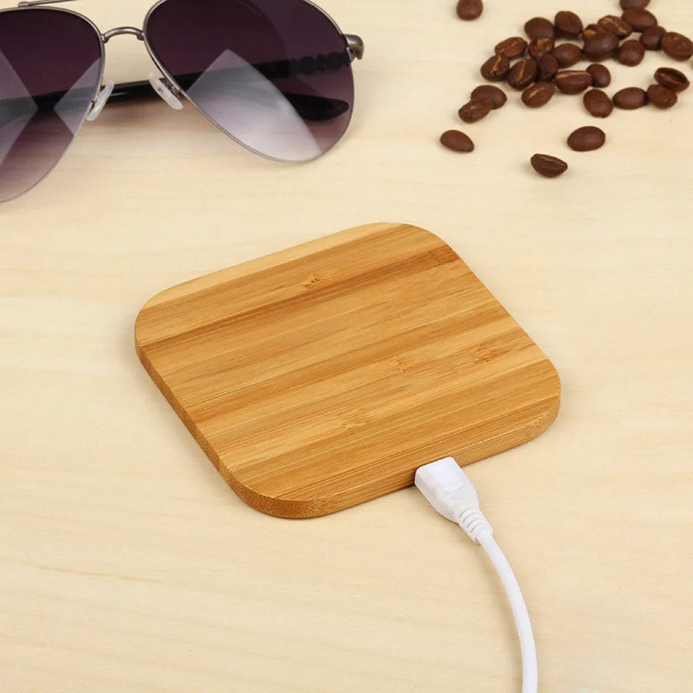Square wooden bamboo wireless charging pad showing 92mm dimensions with Qi charging indicator light