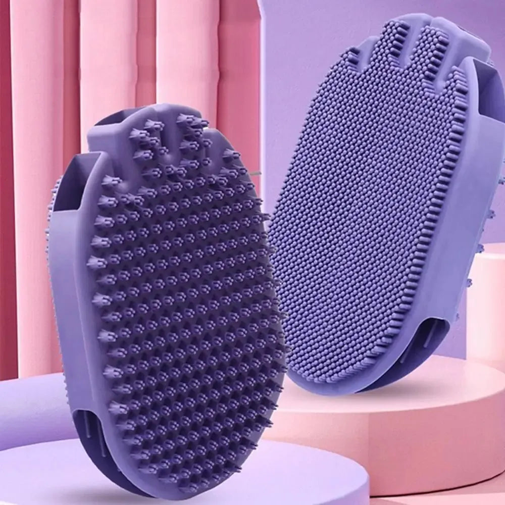 Purple massaging pet shampoo brush with soft TPR bristles, dual-sided dog grooming tool on white background