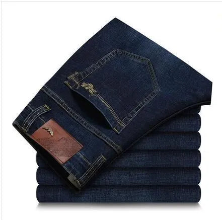 Men's elastic business straight jeans in 8151 blue wash with worn white finish, zipper fly, and pocket details