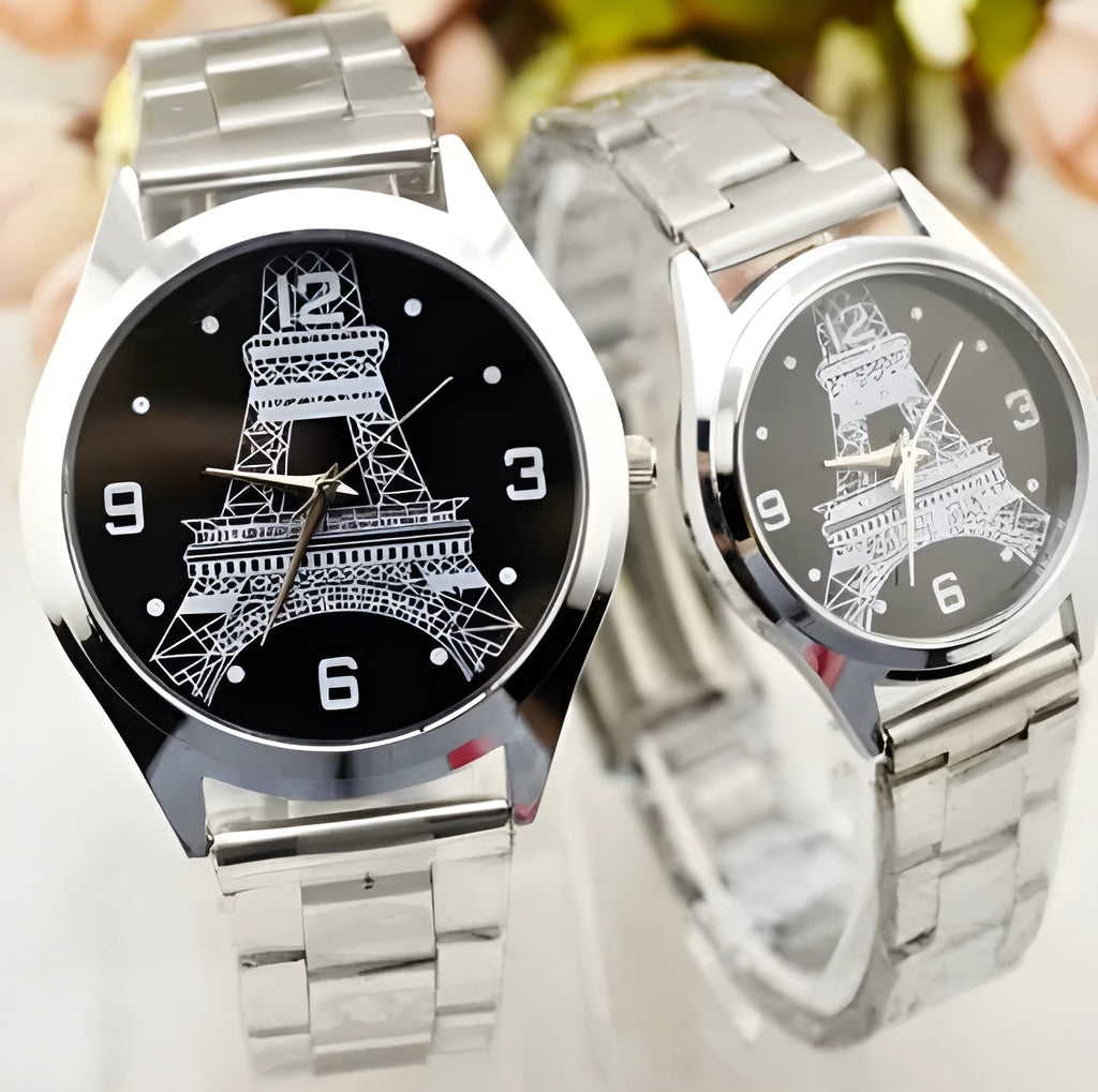 Black leather strap watch with an Eiffel Tower model on the case and an analogue dial