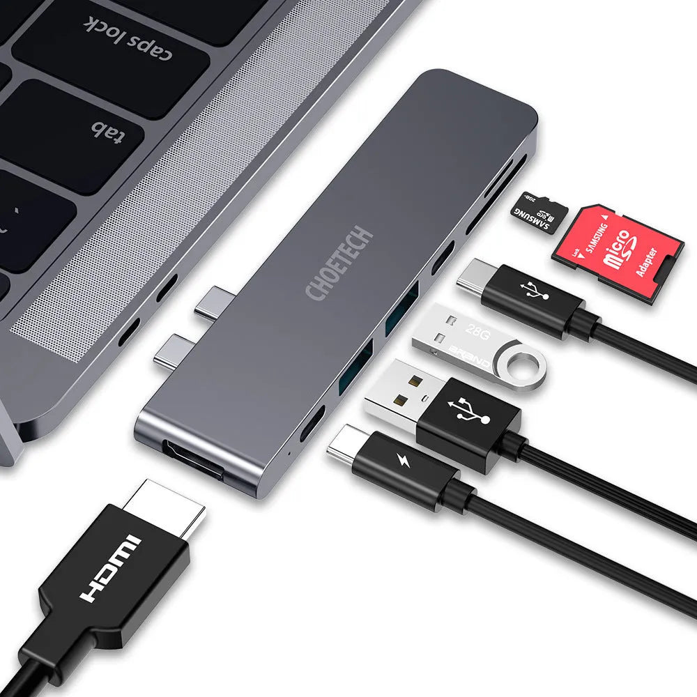 Slim aluminium USB-C hub adapter with SD card slot, HDMI, USB 3.0, and USB-C ports