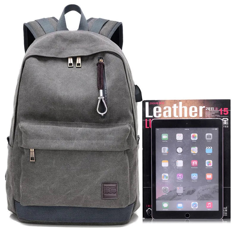 Coffee coloured canvas backpack with USB charging port and multiple zippered compartments