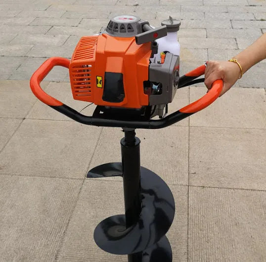 Portable single-person gasoline hole digger for fruit tree fertilization, shown with engine and digging attachment