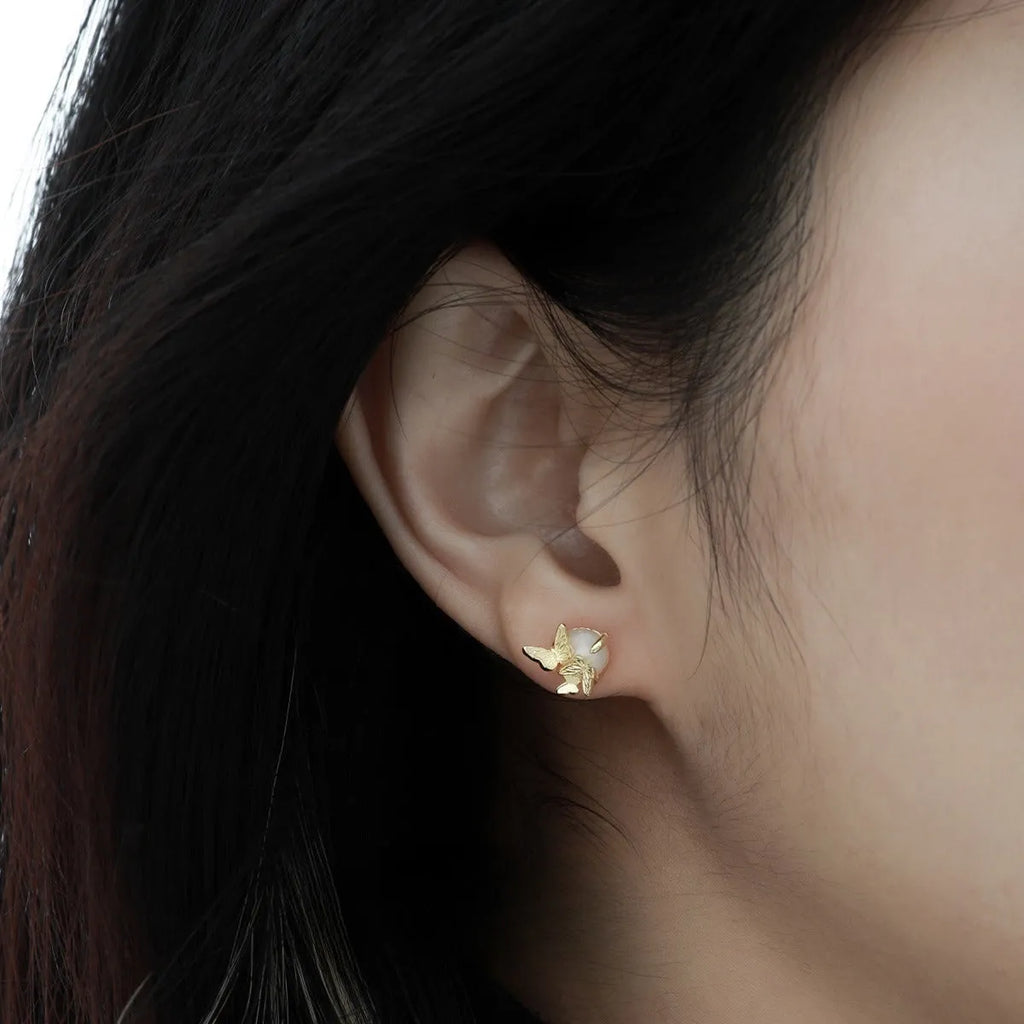 Women's 925 silver butterfly ear studs in electroplated white gold or gold colour with animal zodiac design