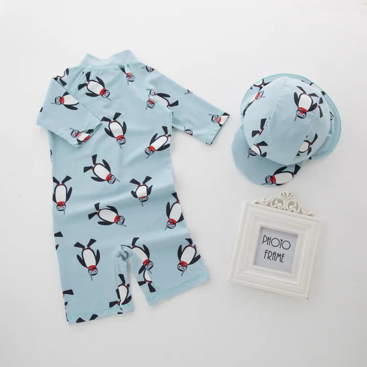 Boys' penguin print one-piece swimsuit with long sleeves and matching swimming cap for children aged 2-7 years