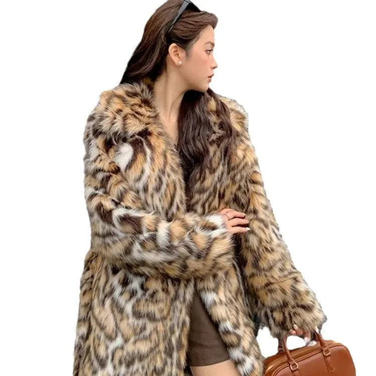 Faux fur coat with fur collar available in mid-length or long style with pockets