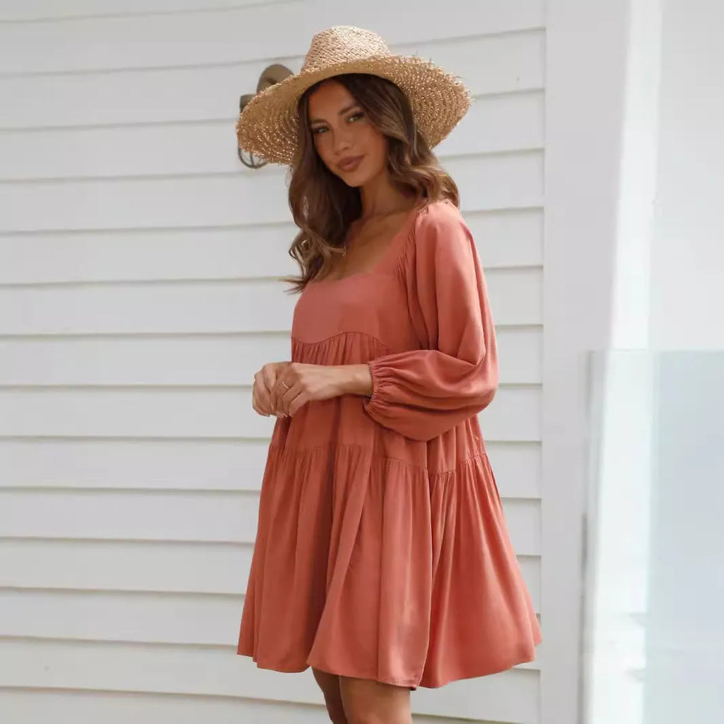 Children's orange backless dress with square collar neckline and puff sleeves in A-line silhouette