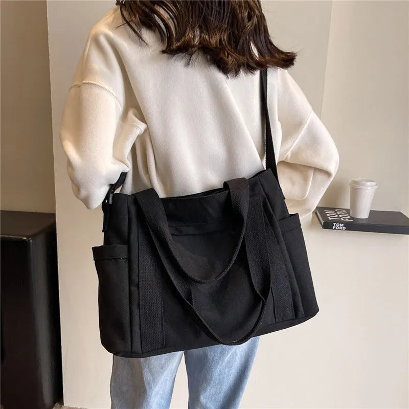 Large capacity polyester shoulder tote bag for women in solid colours with mobile phone pocket