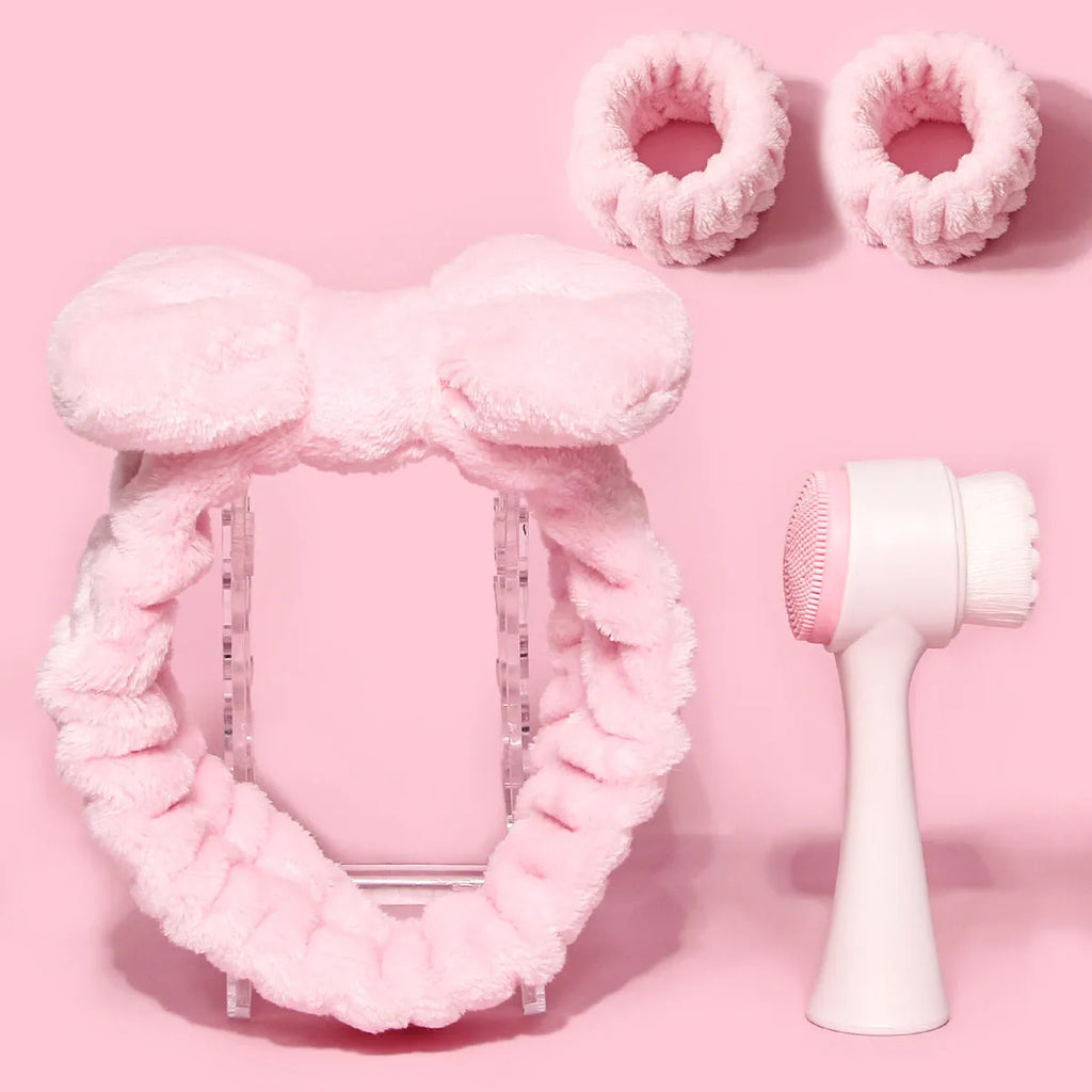 Facial brush set with coral fleece hair band and four nylon brush heads in purple grey white pink colours