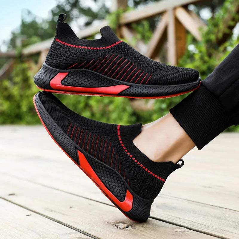 Men's mesh slip-on sneakers with striped design and Flyknit upper in lace-up running shoe style