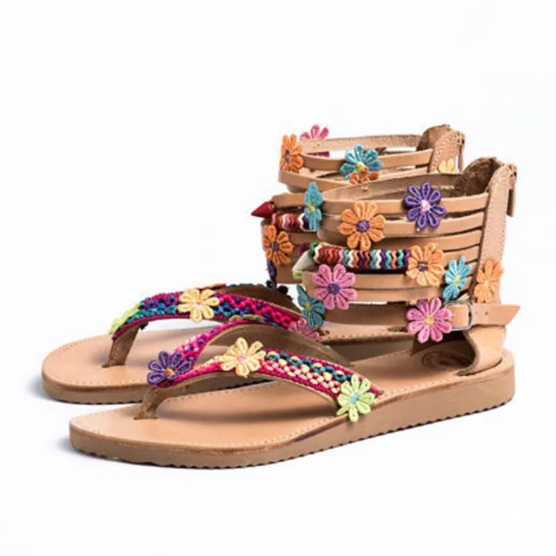 Women's beaded petal flower decoration on ethnic Roman-style flat sandals with artificial PU upper.