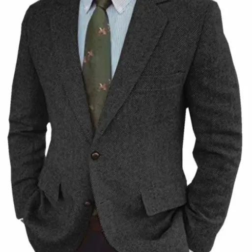 Men's brown herringbone pattern retro suit jacket with long sleeves on a hanger.