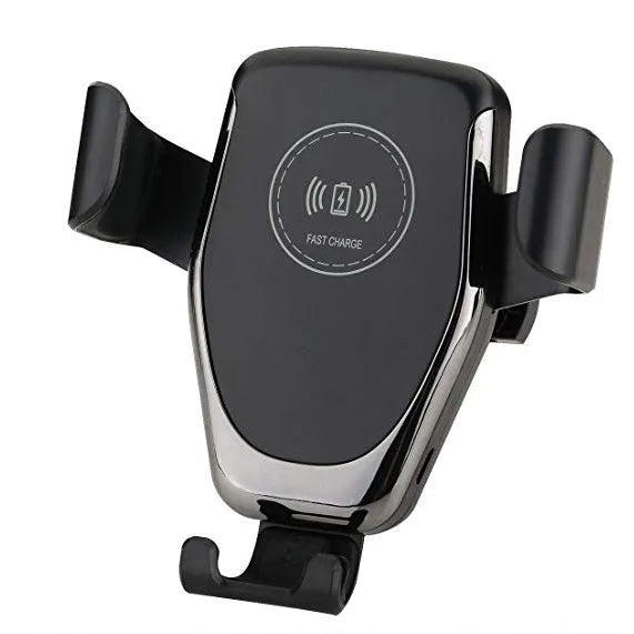 Black car wireless charger mounted on vent with iPhone secured by automatic clamping arms