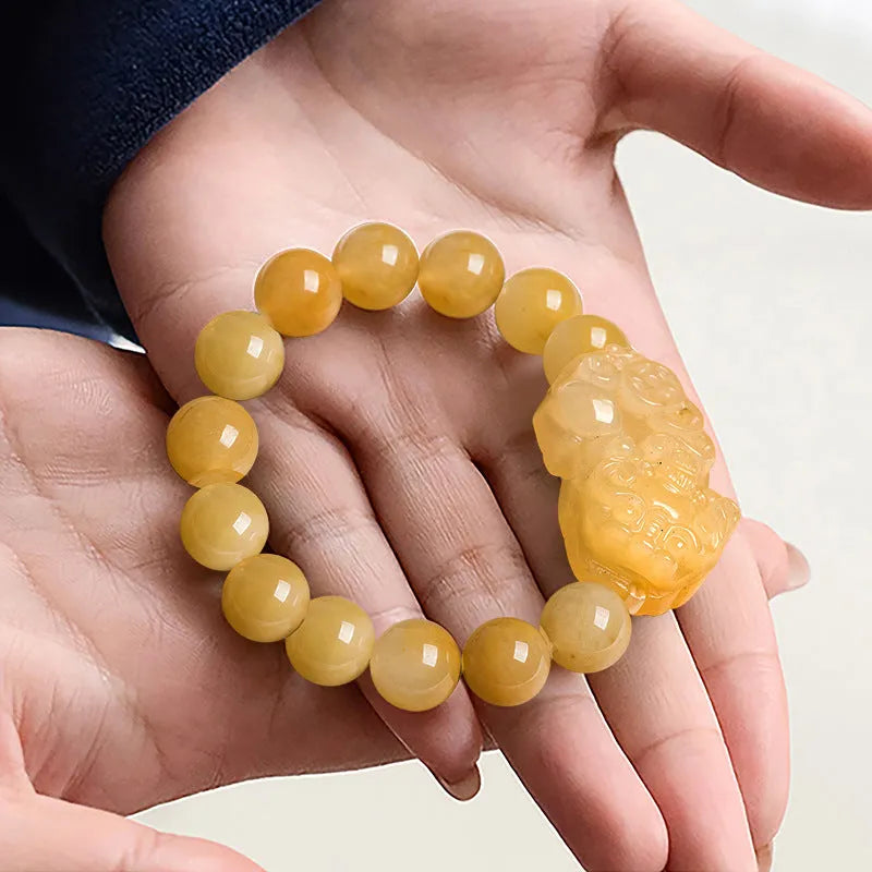 Carved Jinsi Jade money bracelet with golden thread patterns in two size options