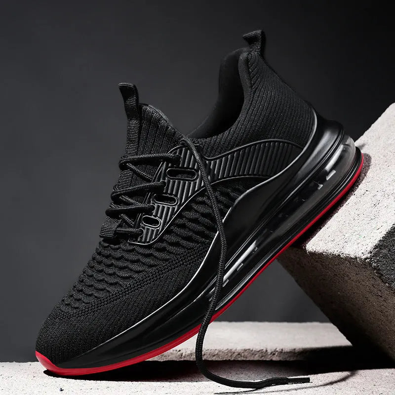 Men's low-top mesh running shoes in black with rubber sole and lace-up front