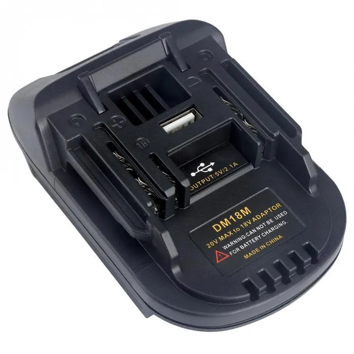 Black battery adapter converting Milwaukee DM18M tools to MAKITA H99F batteries measuring 125x90x65mm