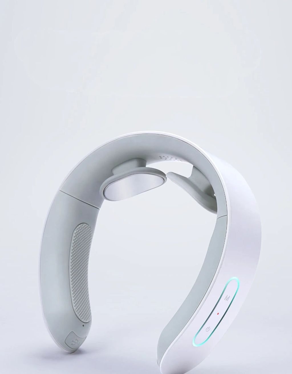 White electric acupressure massager showing control buttons and heat function for back neck shoulder pain relief