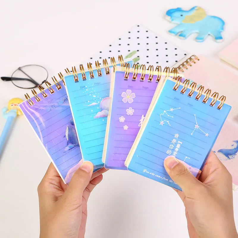 A7 spiral-bound rollover coil notebook showing PP cover in design series option with pages flipped over