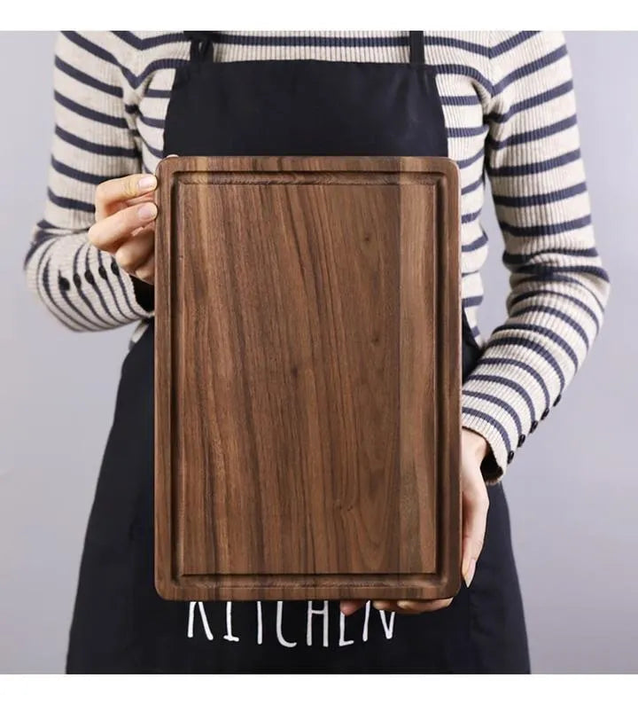 Black walnut wood cutting board with juice groove and side handle