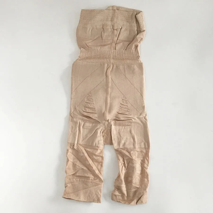Black seamless high-waist shapewear shorts for women laid flat.