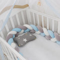 Braided knot style baby cot bumper in spandex crystal velvet fabric, shown in a light grey colour.