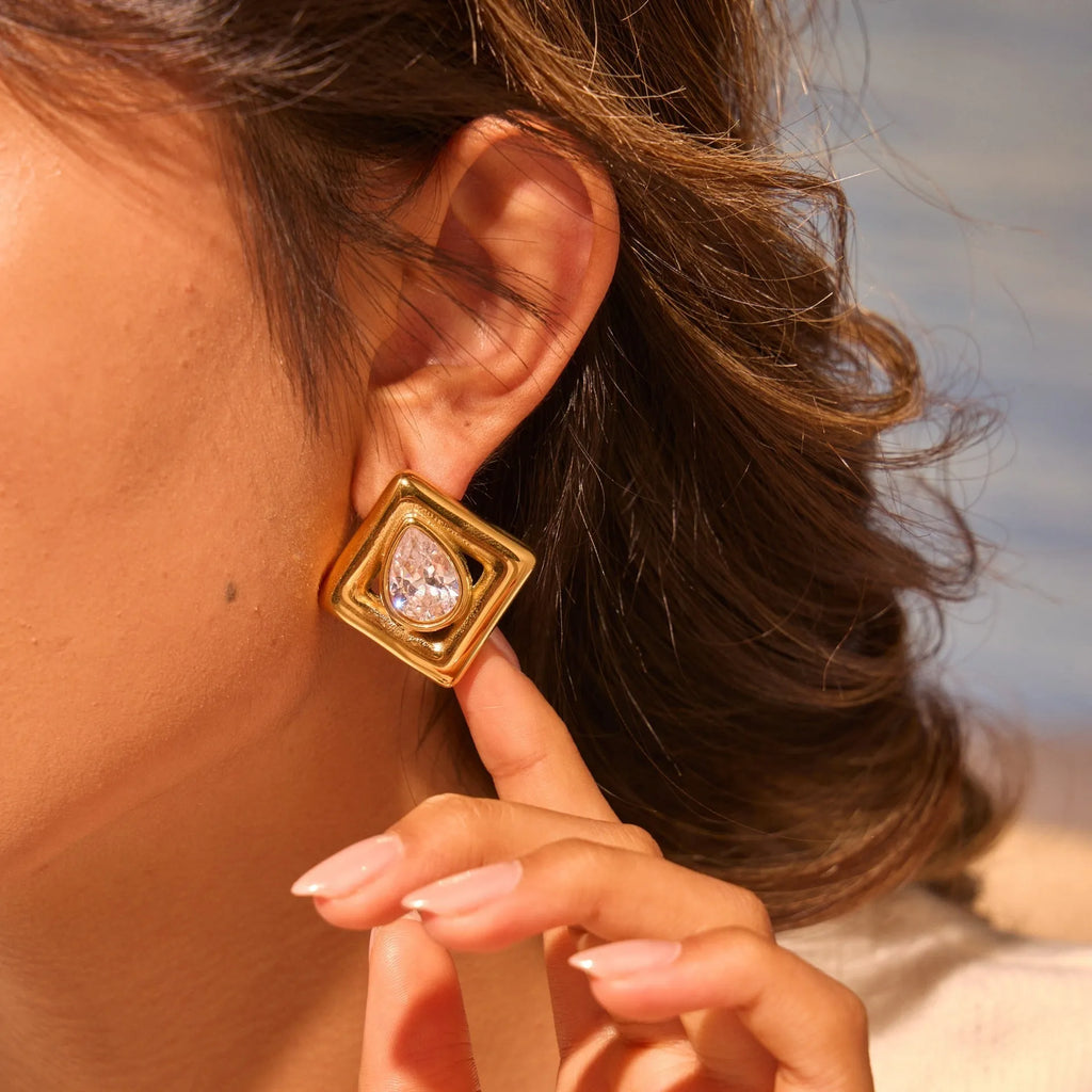 Geometric gold stud earrings with water drop zircon stones on stainless steel
