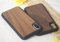 Wooden and TPU hybrid phone case for iPhone showing natural bamboo back and black rubberised sides.