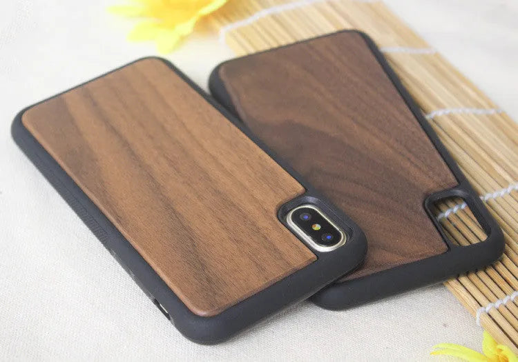 Wooden and TPU hybrid phone case for iPhone showing natural bamboo back and black rubberised sides.