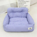 Car-mounted pet outing nest in grey and blue plaid options showing stain-resistant cloth construction