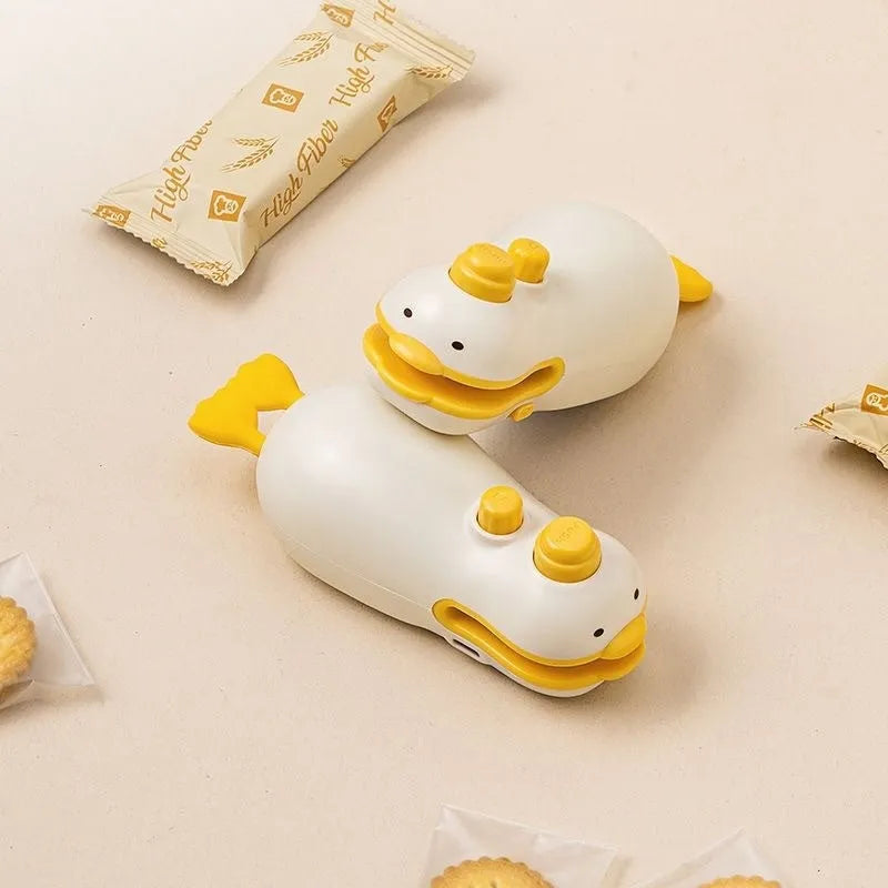 Small yellow duck rechargeable plastic sealing machine with animal jacquard pattern and USB charging cable