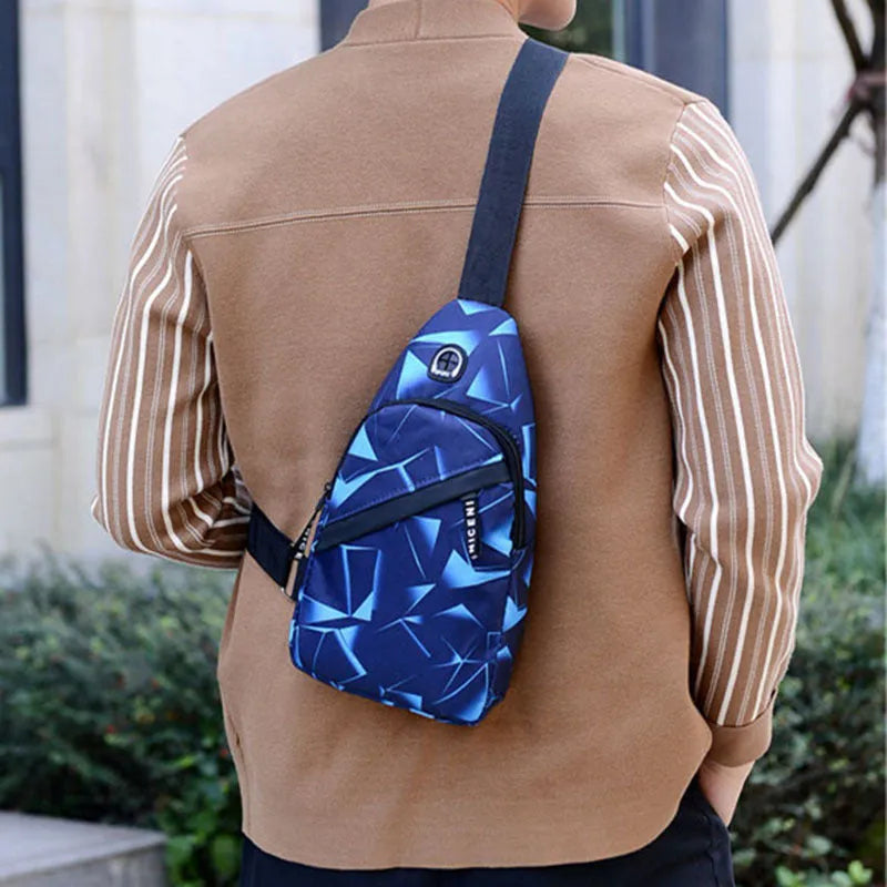 Blue print sling chest bag for men with crossbody strap and visible earphone hole