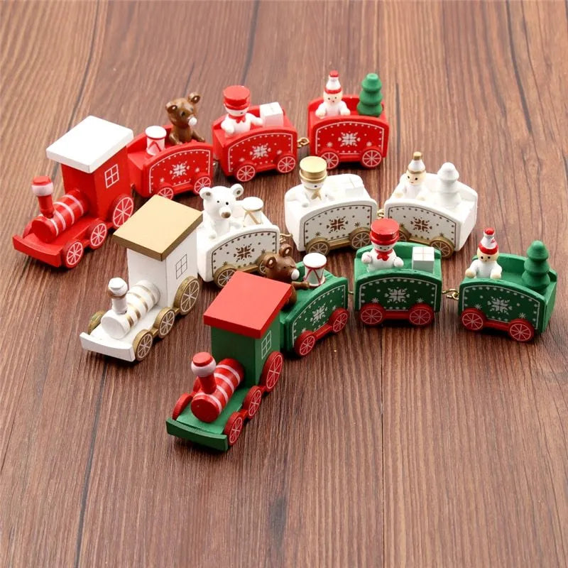 Four mini wood train cars in red, white, and green paint linked together on a shelf