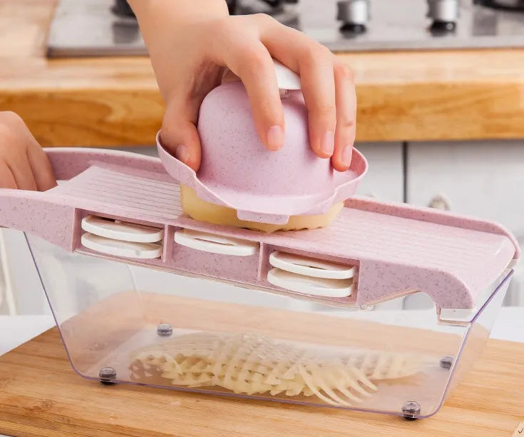 Multifunctional Vegetable Cutter with 7 blades, body in wheat straw material, stainless steel blades, 31.8x11.5x11.5 cm, on kitchen counter