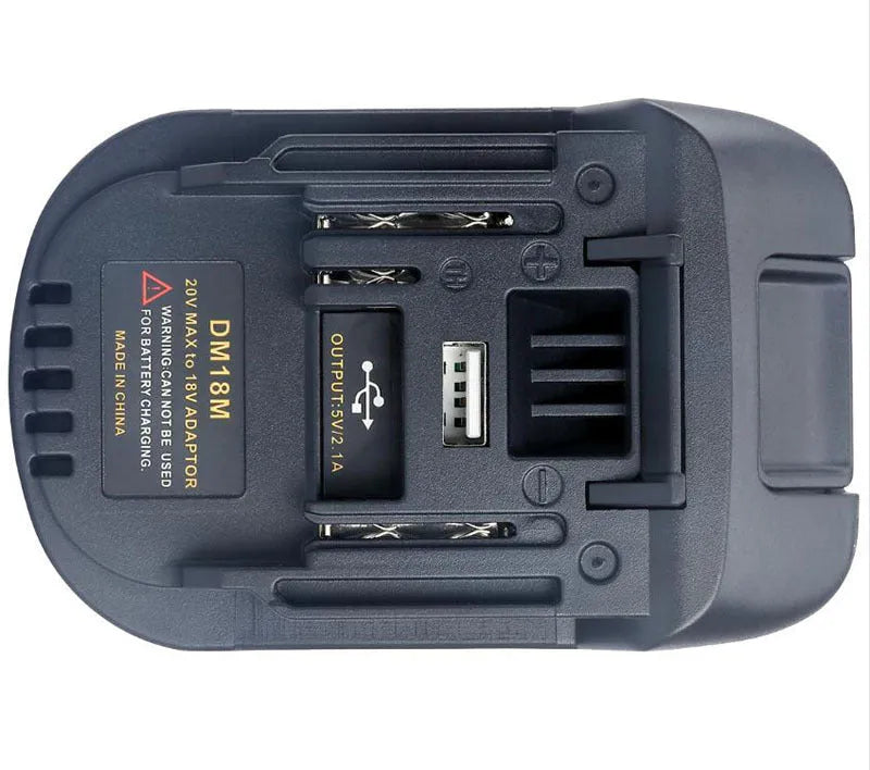 Black battery adapter converting Milwaukee DM18M tools to MAKITA H99F batteries measuring 125x90x65mm