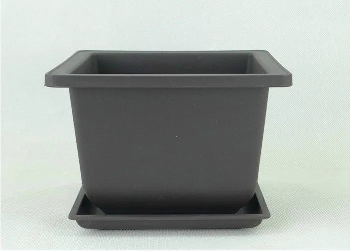 Dark brown antique style recycled plastic plant pot in large rectangle shape for garden or home use