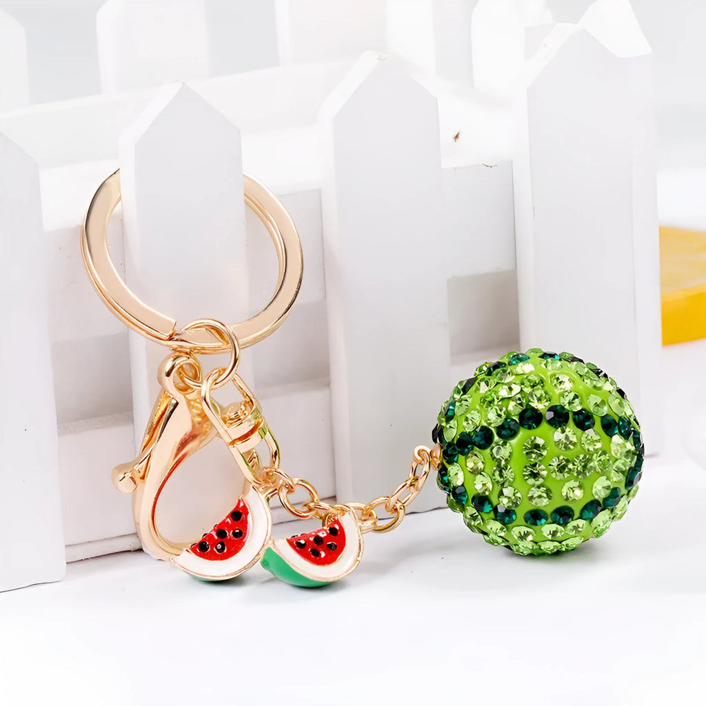 Green watermelon shaped zinc alloy keychain with diamond detailing measuring 12cm length