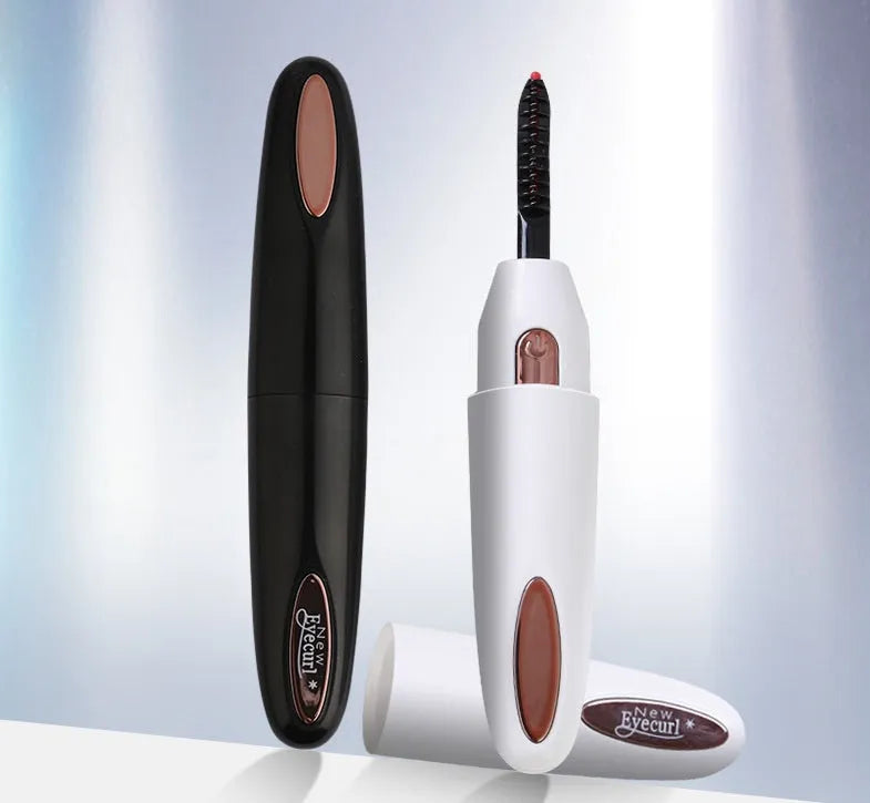 Electric rechargeable eyelash curler in black with silicone pad and temperature button