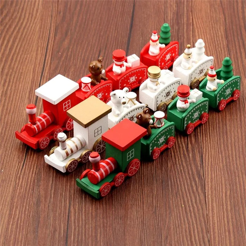 Four mini wood train cars in red, white, and green paint linked together on a shelf