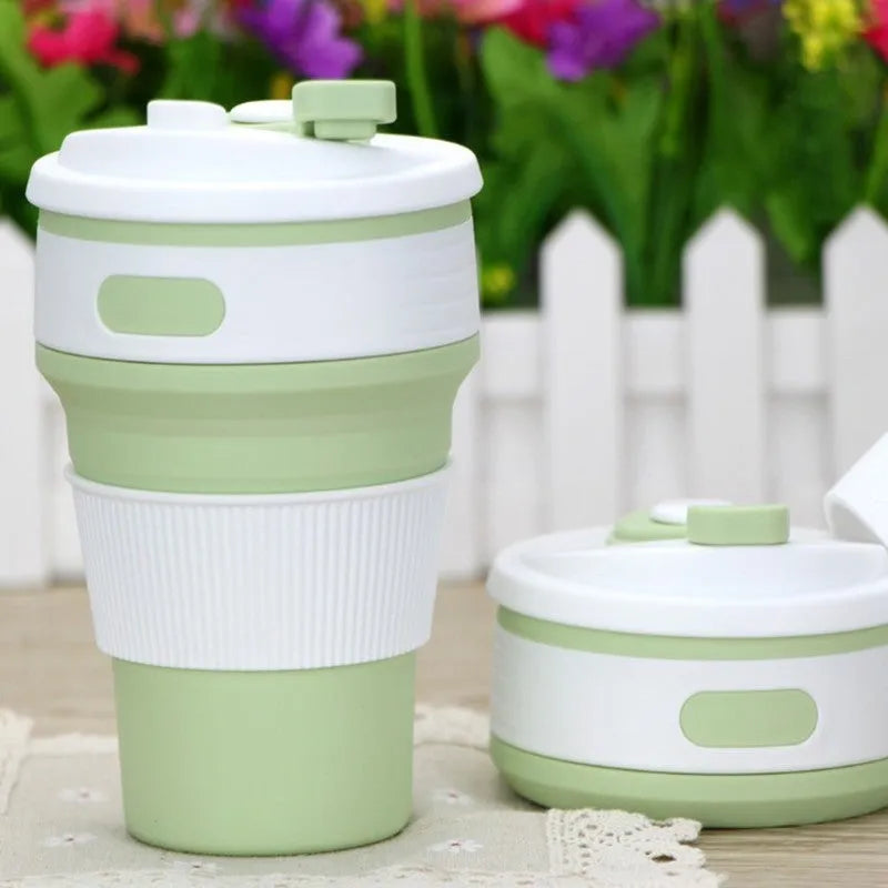 Collapsible silicone travel cup shown expanded and folded with leak-proof cover