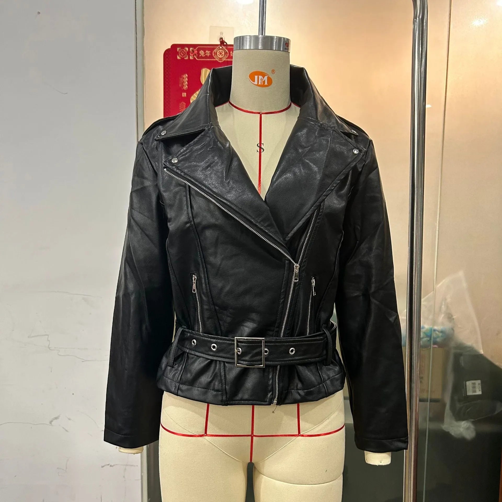 Punk short belt lapel locomotive style jacket in black with Peter Pan collar.